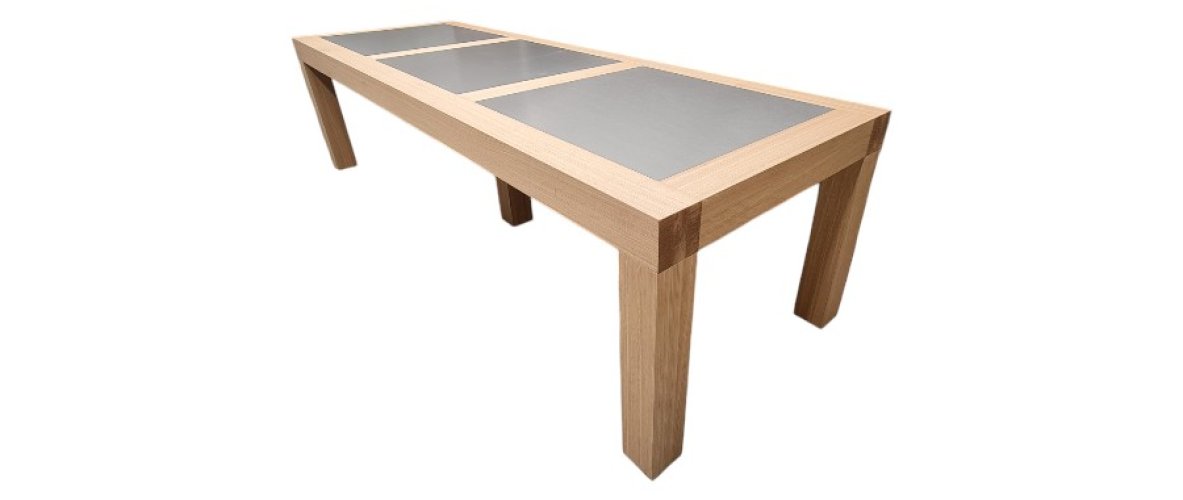 Lange eiken tafel met RVS elementen